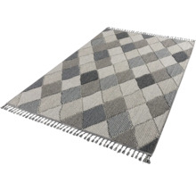 Teppich mit Rautenmuster und Fransen