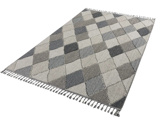 Teppich mit Rautenmuster und Fransen