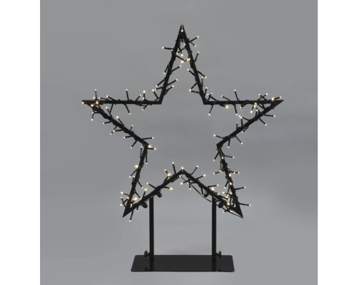 Dekorativer Stern mit Lichtern auf einem Ständer für den Innenbereich