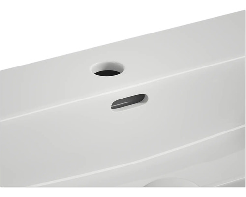 Detailansicht eines Waschtisches mit Hahnloch und Überlauf