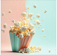 Eine Schale Popcorn mit verstreuten Körnern