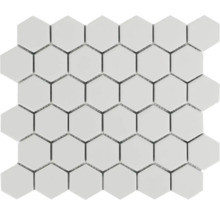 Weiße Mosaikfliese mit sechseckigen Elementen