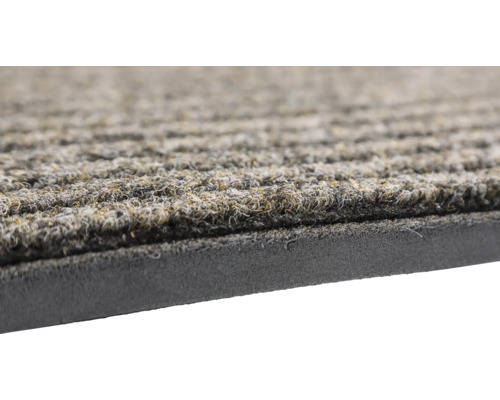 Detailansicht einer Fußmatte mit gerippter Oberfläche und Gummirückseite