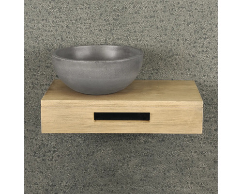 Waschbecken aus Beton auf einem Holzregal