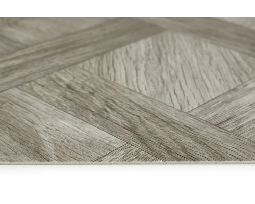 Bodenbelag mit Holzoptik im Fischgrätmuster