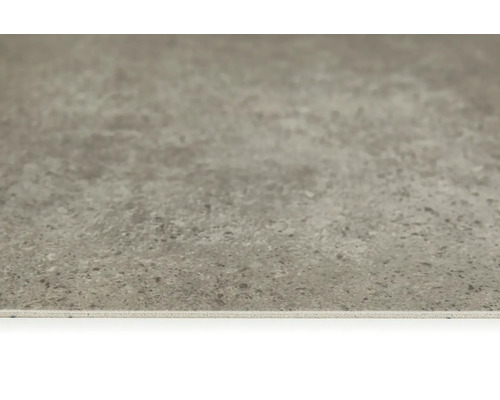 Nahaufnahme einer grauen Bodenfliese mit matter Oberfläche.