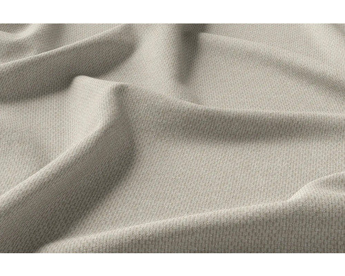 Nahaufnahme von beigefarbenem Möbelstoff mit feiner Textur