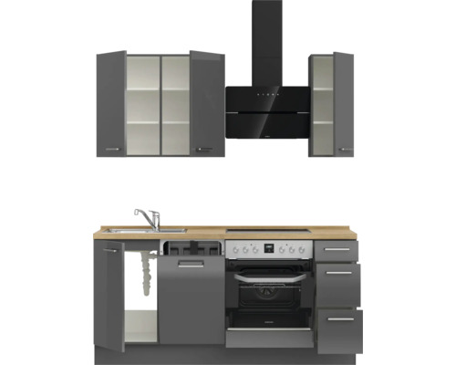 Komplette Küche mit Spüle, Herd, Dunstabzugshaube und Schränken für eine praktische Küchenausstattung