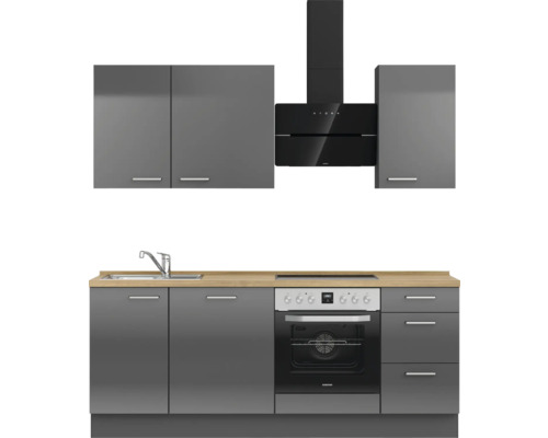 Graue Küchenzeile mit Spüle, Herd, Ofen und Dunstabzugshaube