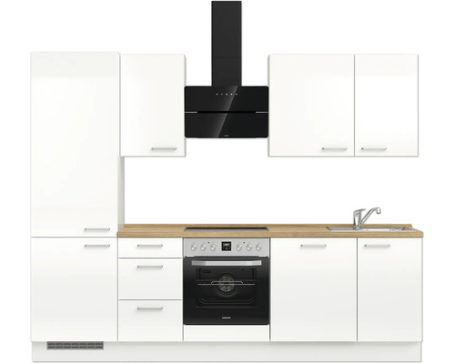 Küchenzeile mit Spüle, Herd, Ofen und Dunstabzugshaube