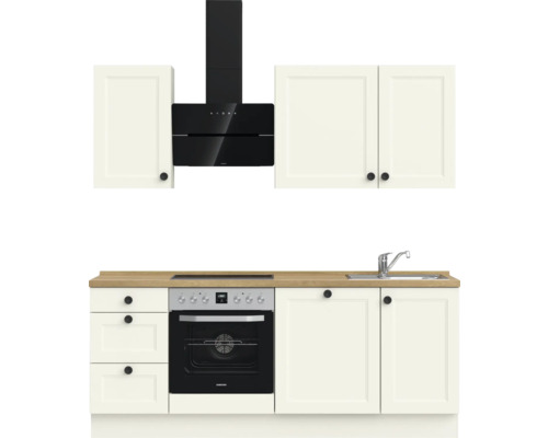 Küchenzeile mit Spüle, Herd, Backofen, Dunstabzugshaube und Schränken