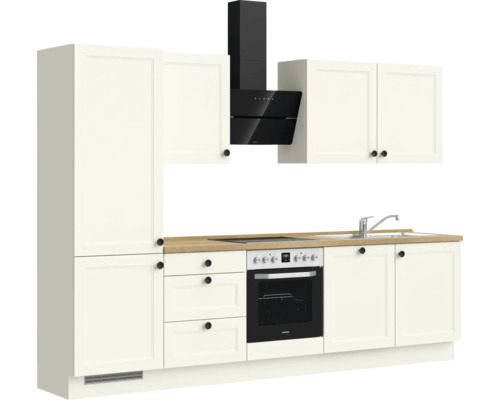 Küchenzeile mit Spüle, Herd, Dunstabzugshaube und Schränken