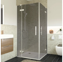 Eckdusche mit Duschkopf und Handbrause im Badezimmer.