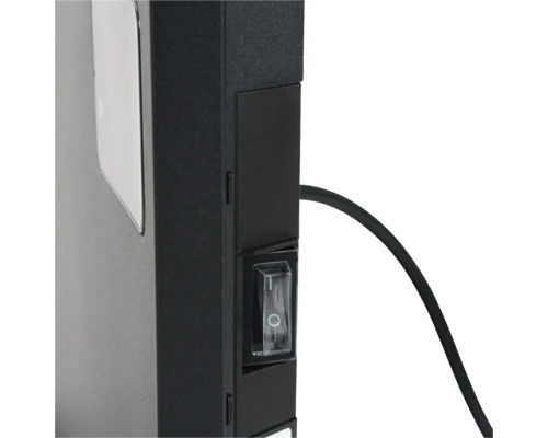 Detailansicht eines Heizkörpers mit Netzschalter