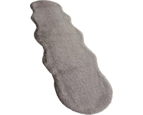 Graue Schaffell-Bettumrandung