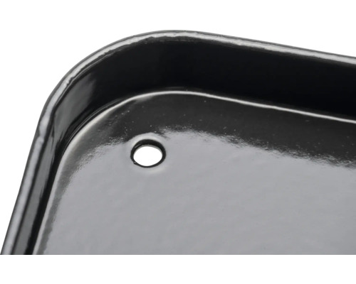 Detailaufnahme einer schwarzen Emaille-Auffangschale mit Loch