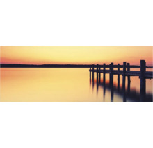 Holzsteg am See bei Sonnenuntergang