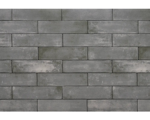 Graue Verblendsteine bilden eine Wand