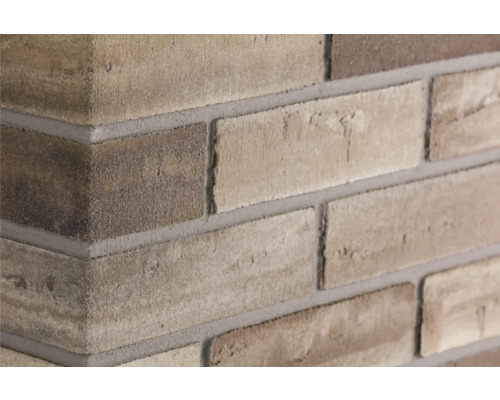 Elabrick Eckverblender Limburg 24 x 11,5 x 7,1 cm Nahaufnahme einer gemauerten Ecke mit Ziegelsteinen und Fugen.