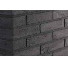 Nahaufnahme einer schwarzen Ziegelwand