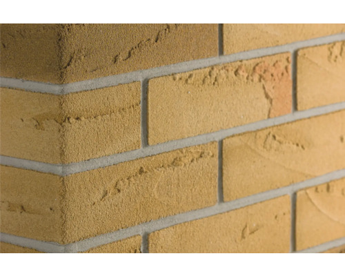 Elabrick Eckverblender Murcia 24 x 11,5 x 7,1 cm Nahaufnahme einer Mauer aus Ziegelsteinen