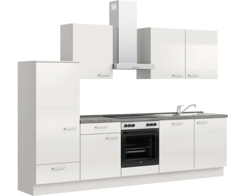 Komplette Küchenzeile mit Spüle, Herd, Dunstabzugshaube und Schränken für eine funktionale Küchenausstattung