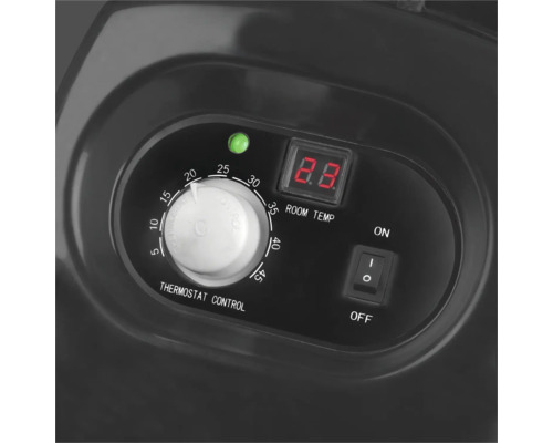 Detailansicht der Bedienelemente eines Heizgeräts mit Thermostatregler und digitaler Temperaturanzeige