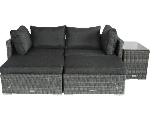 Gartenlounge mit zwei Sitzelementen, Kissen und einem Tisch