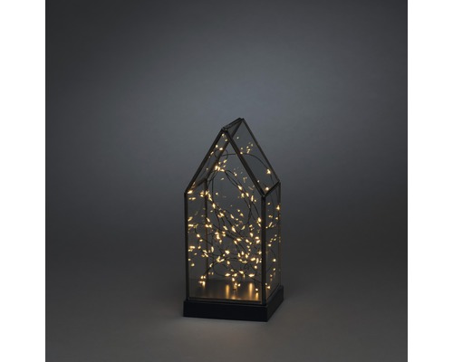 Dekorative Glaslaterne in Hausform mit integrierter Beleuchtung