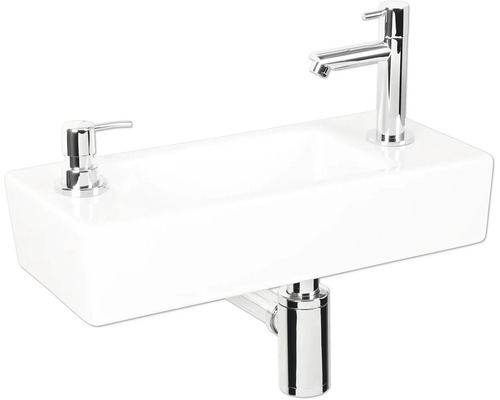 Kleines Waschbecken mit Armatur und Seifenspender