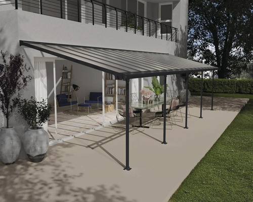 Terrassenüberdachung CANOPIA by Palram Feria 3x9.71 971 x 294 cm anthrazit Terrassenüberdachung aus Aluminium mit Möbeln im Gartenbereich.