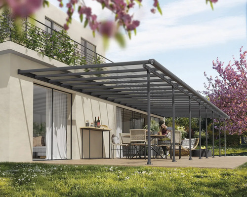 Terrassenüberdachung CANOPIA by Palram Feria 4x12.12 1212 x 380 cm anthrazit Terrassenüberdachung aus Aluminium mit Sitzgruppe auf Terrasse