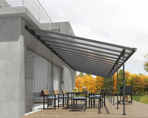 Terrassenüberdachung CANOPIA by Palram Feria 4x12.75 1276 x 380 cm anthrazit Terrassenüberdachung mit Tisch und Stühlen auf einer Terrasse