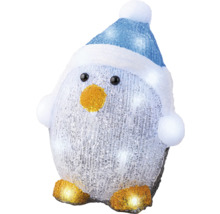 Dekorativer Pinguin mit Mütze und Beleuchtung als Weihnachtsdekoration