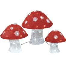 Drei dekorative, beleuchtete Fliegenpilze für den Innenbereich.