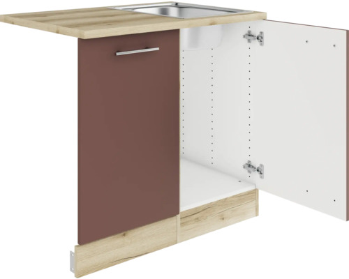 Küchenspüle mit Unterschrank und geöffneter Tür