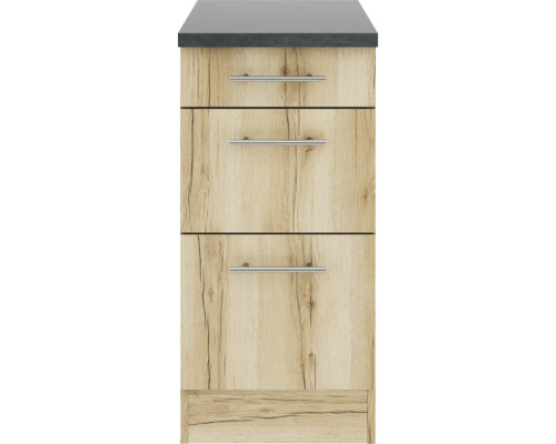 Schmaler Holzschrank mit drei Schubladen und einer dunklen Arbeitsplatte