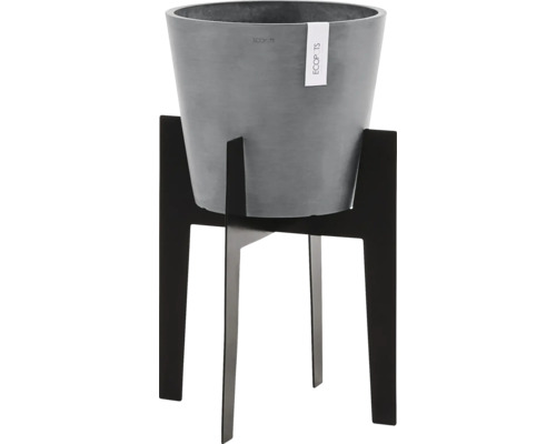 Grauer Blumentopf auf schwarzem Pflanzenständer