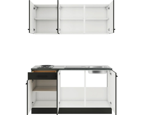 Kleine Küchenzeile mit Hängeschränken und Unterschränken.