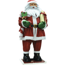Dekorative Weihnachtsmannfigur mit Geschenk und Mistelzweig