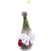 Weihnachtsmann-Figur mit grünem Hut und weißem Bart als Dekoration