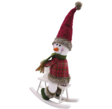 Dekorativer Schneemann auf Schaukelpferd als Weihnachtsdekoration