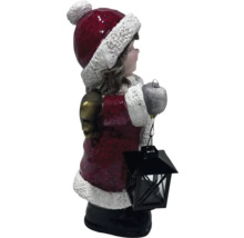 Dekorative Winterfigur eines Mädchens mit Laterne