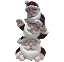Dekorative Santa Claus Figur, bestehend aus drei übereinander gestapelten Weihnachtsmännern