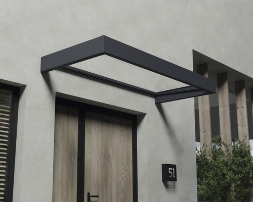 Vordach aus Metall über einer Haustür.