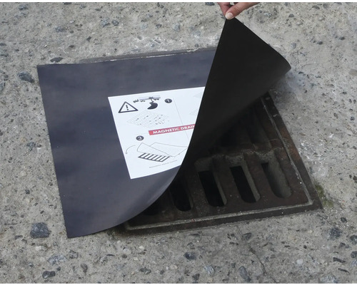 Magnetischer Gullydeckel auf einem Gully