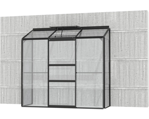 Gewächshaus aus Metall und Glas an einer Betonwand
