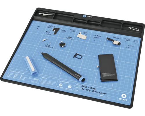 iFixit Reparaturmatte mit Stift und diversen Smartphone-Ersatzteilen