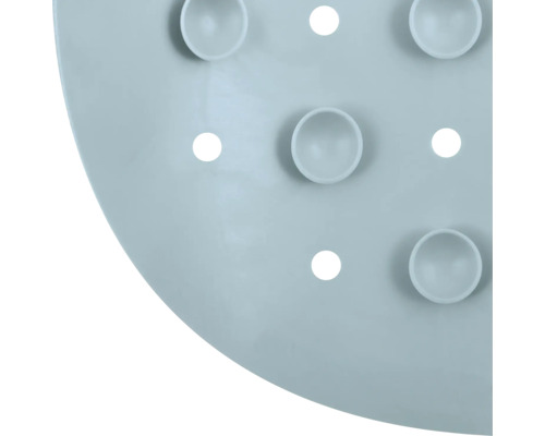 Detailaufnahme einer Badewannenmatte mit Saugnäpfen