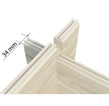 Eckverbindung von Blockbohlen aus Holz mit einer Stärke von 34 Millimetern und Nut-Feder-Profil.